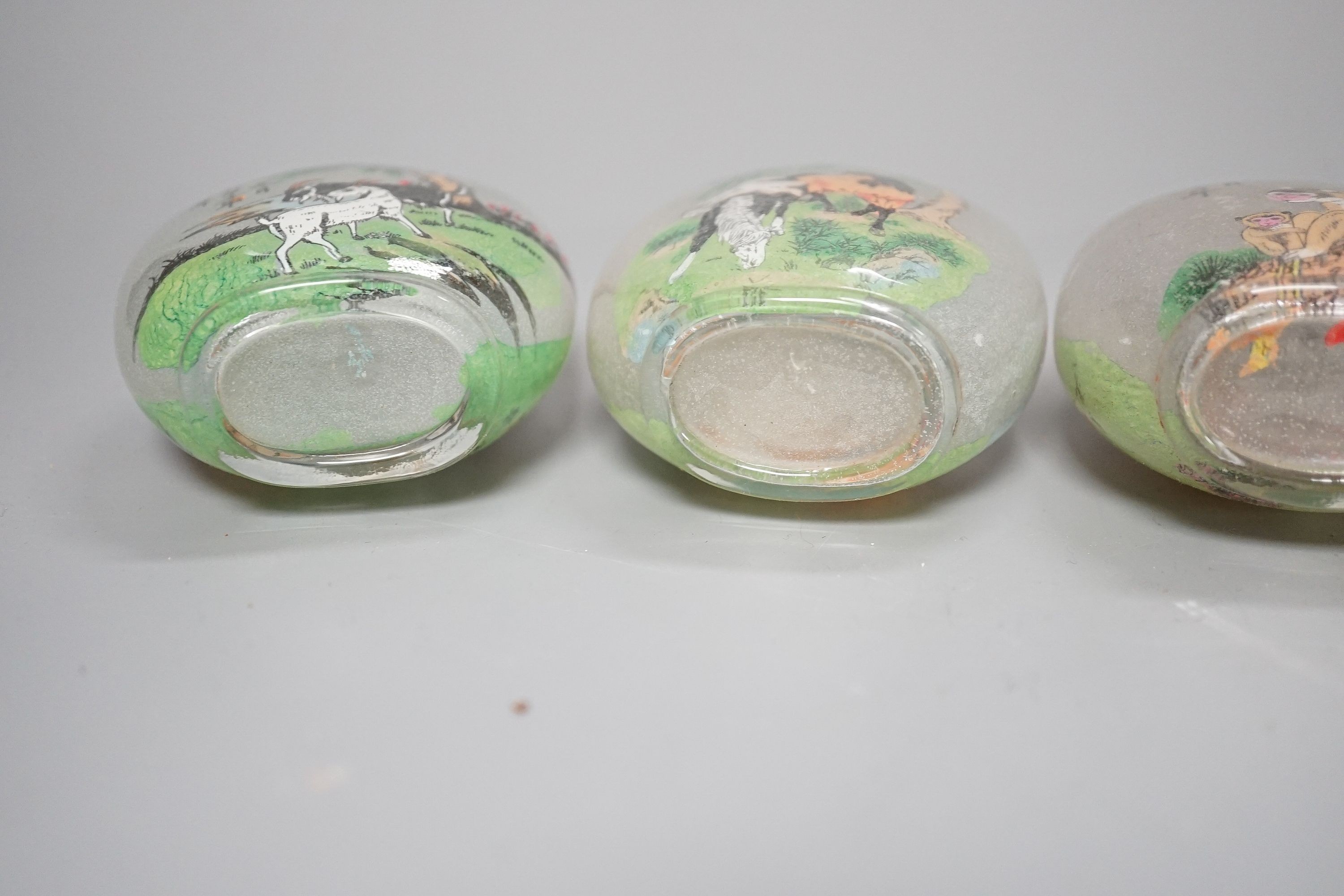 A boxed set of six Chinese inside-painted snuff bottles, height 8cm overall